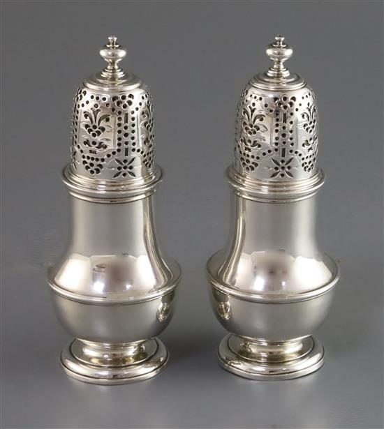 A good pair of early George II silver casters, by Thomas Bamford, 12 oz.
